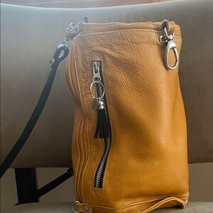 Beautiful handmade Leather purse with adjustable straps.